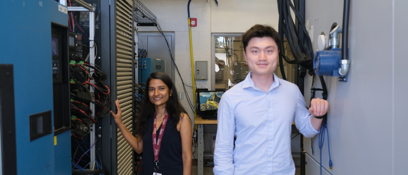 Image of Junran (right) and Sobhika (left) inside the MARC (CMHT) 130 cell testing lab. This image shows the overall size of equipment in the lab.